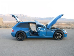 2001 BMW M Coupe in Laguna Seca Blue over Laguna Seca Blue & Black Nappa - Side