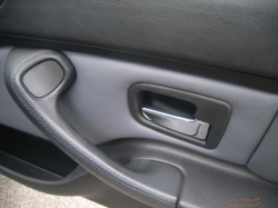 2002 BMW M Coupe in Steel Gray Metallic over Dark Gray & Black Nappa - Passenger Door Detail