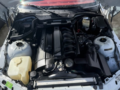 1999 BMW M Coupe in Arctic Silver Metallic over Imola Red & Black Nappa