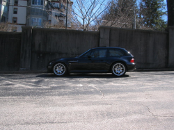 1999 BMW M Coupe in Cosmos Black Metallic over Imola Red & Black Nappa - Side