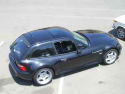 1999 BMW M Coupe in Cosmos Black Metallic over Dark Gray & Black Nappa - Rear 3/4