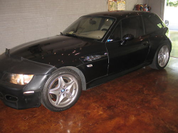 1999 BMW M Coupe in Cosmos Black Metallic over Dark Beige Oregon - Front 3/4