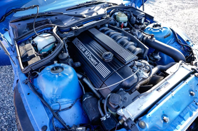 1999 BMW M Coupe in Estoril Blue Metallic over Estoril Blue & Black Nappa