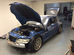 1999 BMW M Coupe in Estoril Blue Metallic over Estoril Blue & Black Nappa