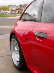 1999 BMW M Coupe in Imola Red 2 over Black Nappa - Side Detail