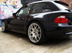 1999 BMW M Coupe in Cosmos Black Metallic over Imola Red & Black Nappa - Side Detail