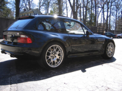 1999 BMW M Coupe in Cosmos Black Metallic over Imola Red & Black Nappa - Rear 3/4