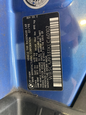 1999 BMW M Coupe in Estoril Blue Metallic over Estoril Blue & Black Nappa