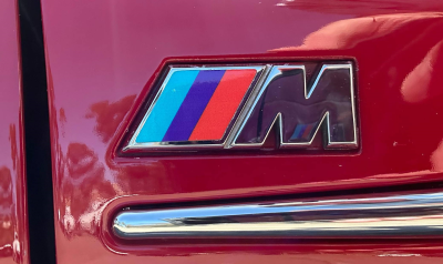 1999 BMW M Coupe in Imola Red 2 over Imola Red & Black Nappa