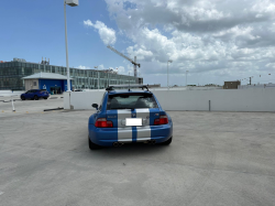 1999 BMW M Coupe in Estoril Blue Metallic over Estoril Blue & Black Nappa