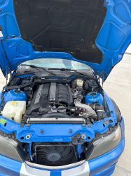 1999 BMW M Coupe in Estoril Blue Metallic over Estoril Blue & Black Nappa