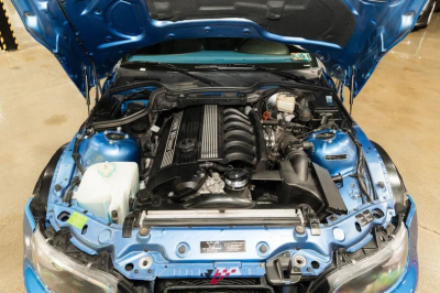 1999 BMW M Coupe in Estoril Blue Metallic over Estoril Blue & Black Nappa