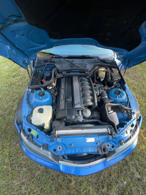 1999 BMW M Coupe in Estoril Blue Metallic over Estoril Blue & Black Nappa