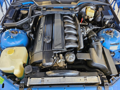 1999 BMW M Coupe in Estoril Blue Metallic over Estoril Blue & Black Nappa