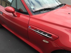 1999 BMW M Coupe in Imola Red 2 over Imola Red & Black Nappa