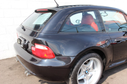 1999 BMW M Coupe in Cosmos Black Metallic over Kyalami Orange & Black Nappa