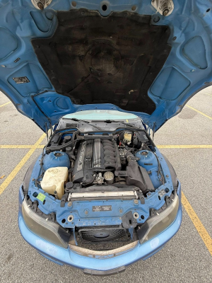 1999 BMW M Coupe in Estoril Blue Metallic over Estoril Blue & Black Nappa