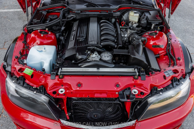 1999 BMW M Coupe in Imola Red 2 over Imola Red & Black Nappa
