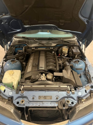 2000 BMW M Coupe in Estoril Blue Metallic over Estoril Blue & Black Nappa