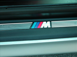 2000 BMW M Coupe in Titanium Silver Metallic over Imola Red & Black Nappa - Door Sill