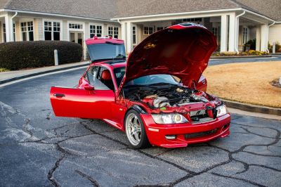 2000 BMW M Coupe in Imola Red 2 over Imola Red & Black Nappa