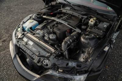 2001 BMW M Coupe in Black Sapphire Metallic over Imola Red & Black Nappa