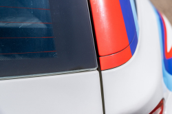 2002 BMW M Coupe in Titanium Silver Metallic over Imola Red & Black Nappa