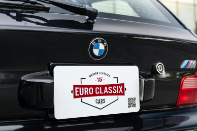 2002 BMW M Coupe in Black Sapphire Metallic over Imola Red & Black Nappa