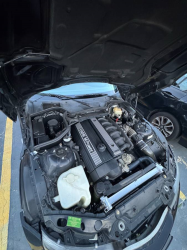 2000 BMW M Roadster in Cosmos Black Metallic over Dark Gray & Black Nappa