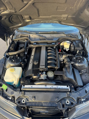 2000 BMW M Roadster in Cosmos Black Metallic over Dark Gray & Black Nappa