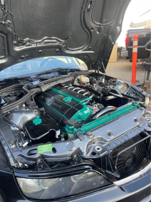 2000 BMW M Roadster in Cosmos Black Metallic over Black Nappa