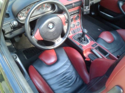 2000 BMW M Roadster in Black Sapphire Metallic over Imola Red & Black Nappa
