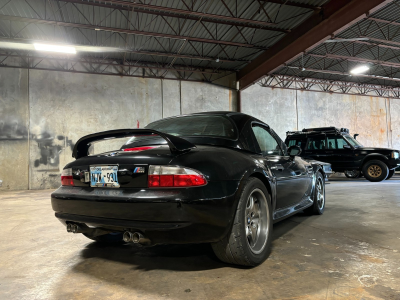 2001 BMW M Roadster in Black Sapphire Metallic over Imola Red & Black Nappa