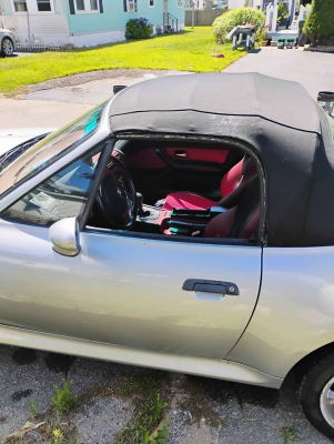 1998 BMW M Roadster in Arctic Silver Metallic over Imola Red & Black Nappa