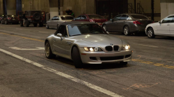 1999 BMW M Roadster in Arctic Silver Metallic over Imola Red & Black Nappa