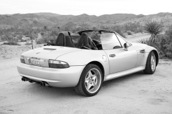 1999 BMW M Roadster in Arctic Silver Metallic over Imola Red & Black Nappa