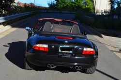 1999 BMW M Roadster in Cosmos Black Metallic over Imola Red & Black Nappa