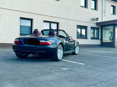 1999 BMW M Roadster in Cosmos Black Metallic over Imola Red & Black Nappa