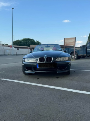 1999 BMW M Roadster in Cosmos Black Metallic over Imola Red & Black Nappa