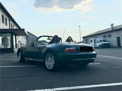 1999 BMW M Roadster in Cosmos Black Metallic over Imola Red & Black Nappa