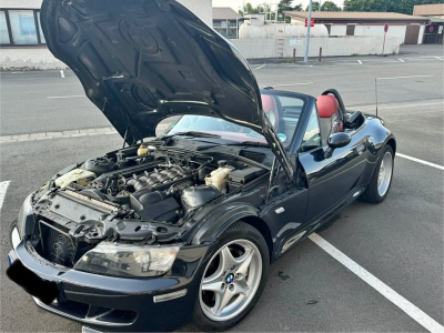 1999 BMW M Roadster in Cosmos Black Metallic over Imola Red & Black Nappa