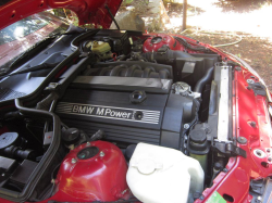 1999 BMW M Roadster in Imola Red 2 over Imola Red & Black Nappa