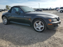 1998 BMW M Roadster in Cosmos Black Metallic over Imola Red & Black Nappa