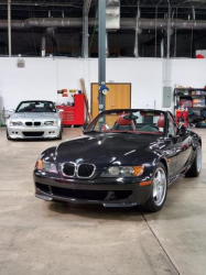 1998 BMW M Roadster in Cosmos Black Metallic over Imola Red & Black Nappa