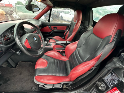 1998 BMW M Roadster in Cosmos Black Metallic over Imola Red & Black Nappa