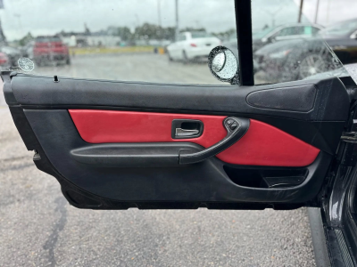 1998 BMW M Roadster in Cosmos Black Metallic over Imola Red & Black Nappa