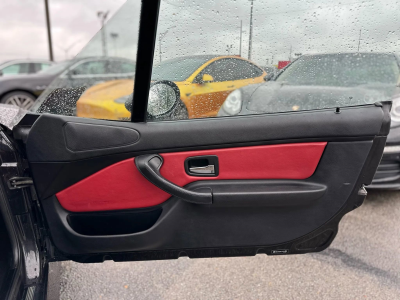 1998 BMW M Roadster in Cosmos Black Metallic over Imola Red & Black Nappa