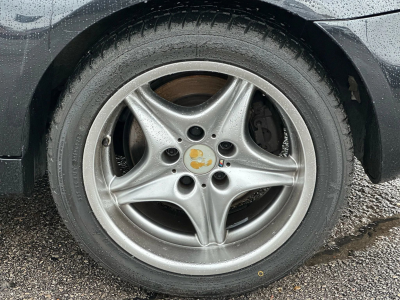 1998 BMW M Roadster in Cosmos Black Metallic over Imola Red & Black Nappa