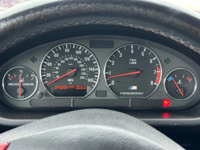 1998 BMW M Roadster in Cosmos Black Metallic over Imola Red & Black Nappa