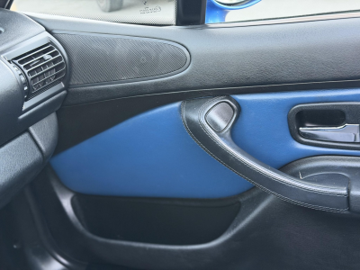 1998 BMW M Roadster in Estoril Blue Metallic over Estoril Blue & Black Nappa